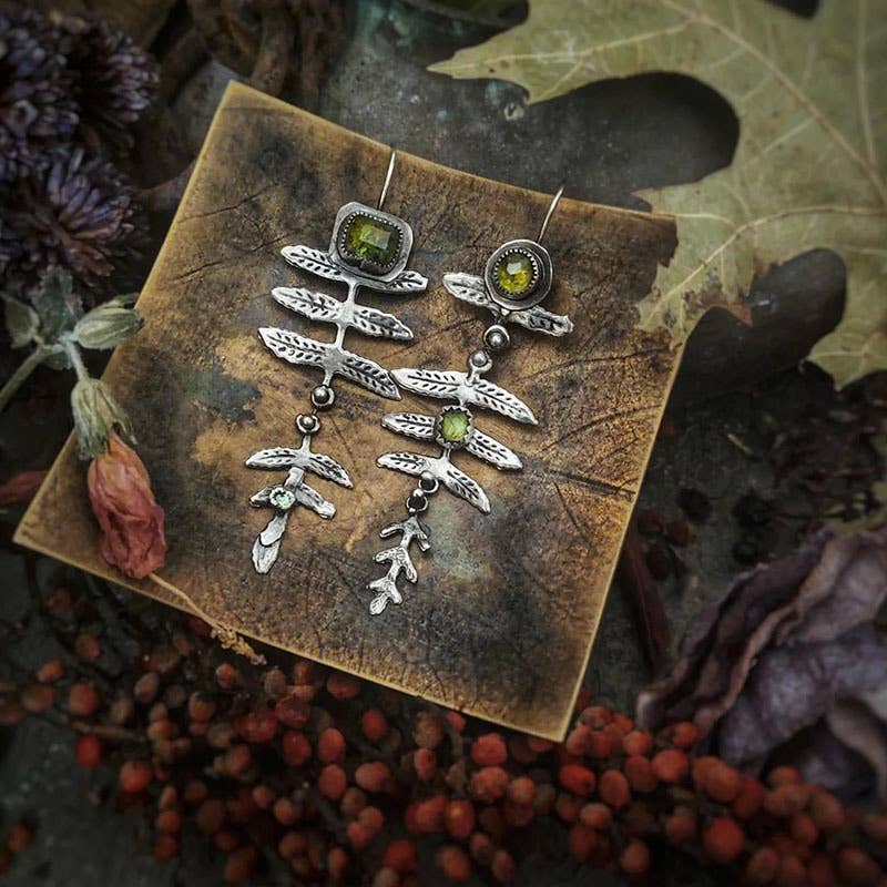 Vintage metal leaf inlaid olive green rhinestone earrings
