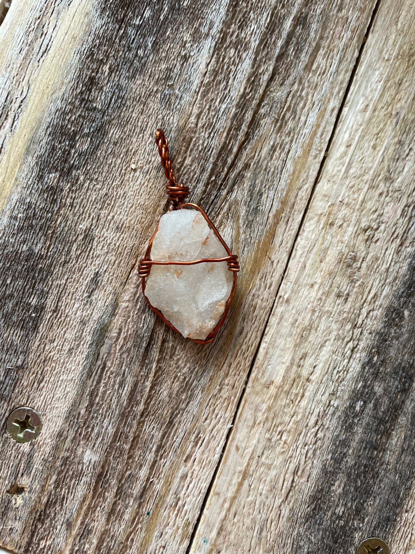 Raw quartz pendant
