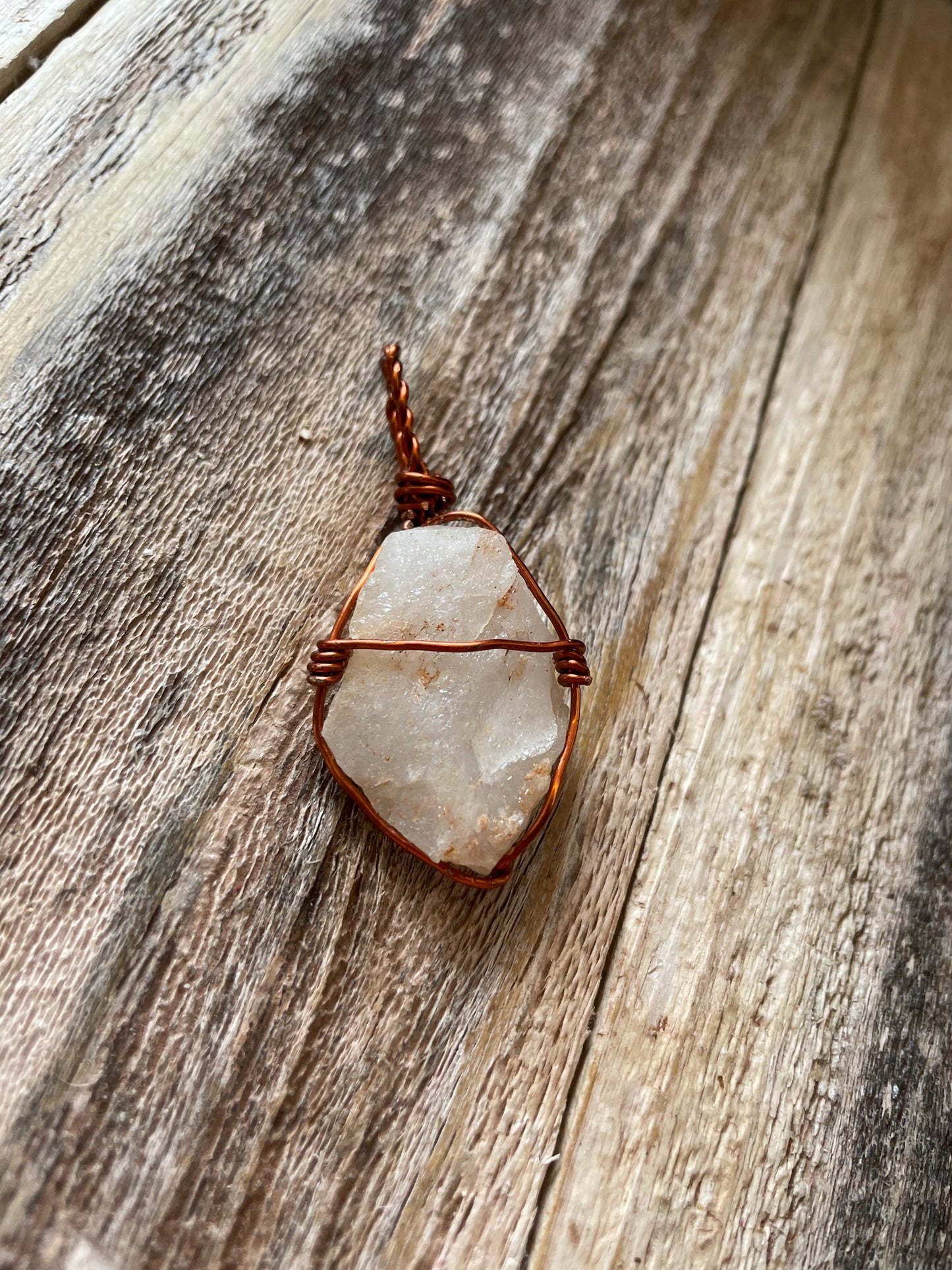 Raw quartz pendant