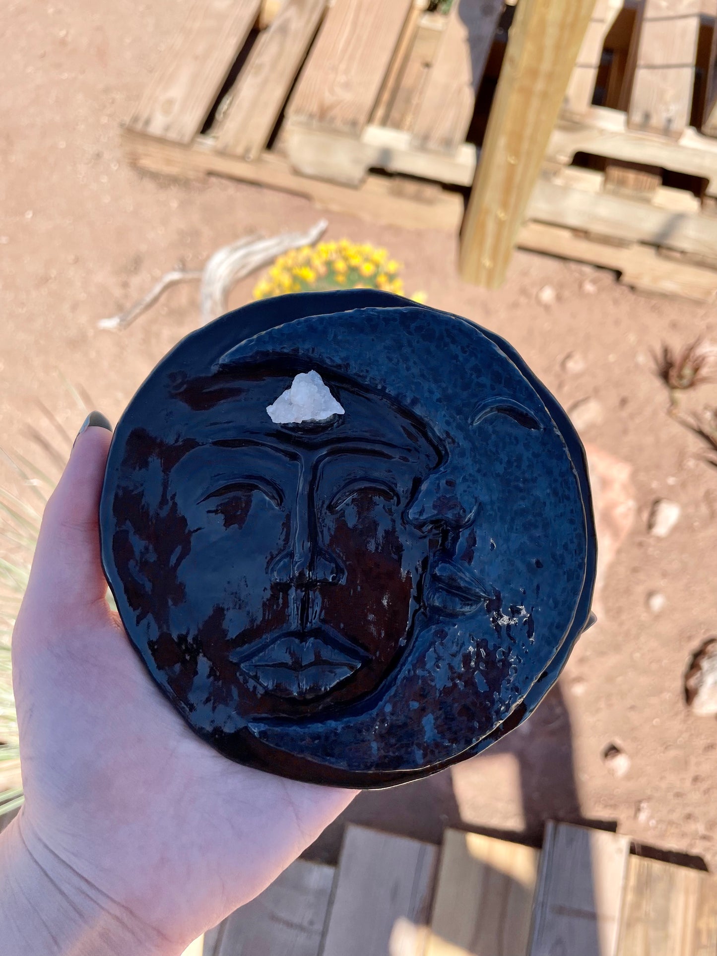 Moon face sculpture