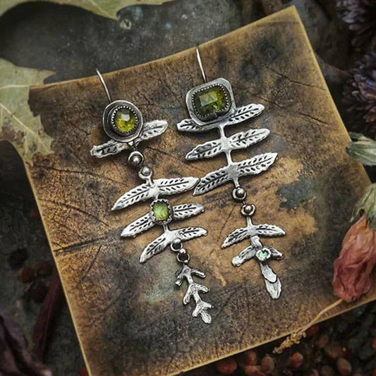 Vintage metal leaf inlaid olive green rhinestone earrings